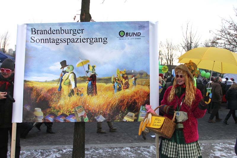 Sybilla Keitel, the artist, with her banner at a political demonstration in Berlin, February 2013